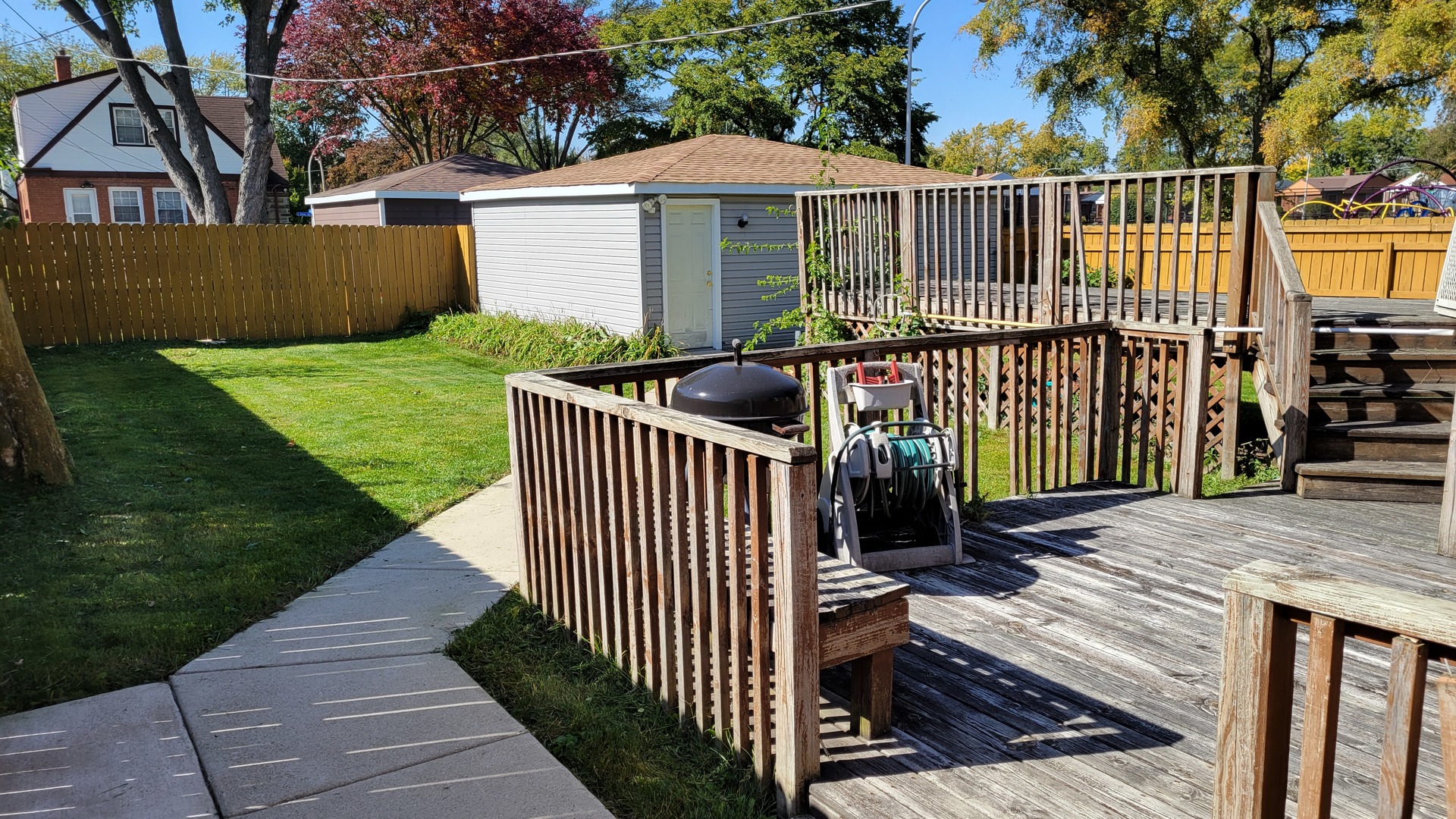 1400 Gardner Road Westchester, IL 60154 - Photo 12 of 12 a view of a wrought iron fences in front of house
