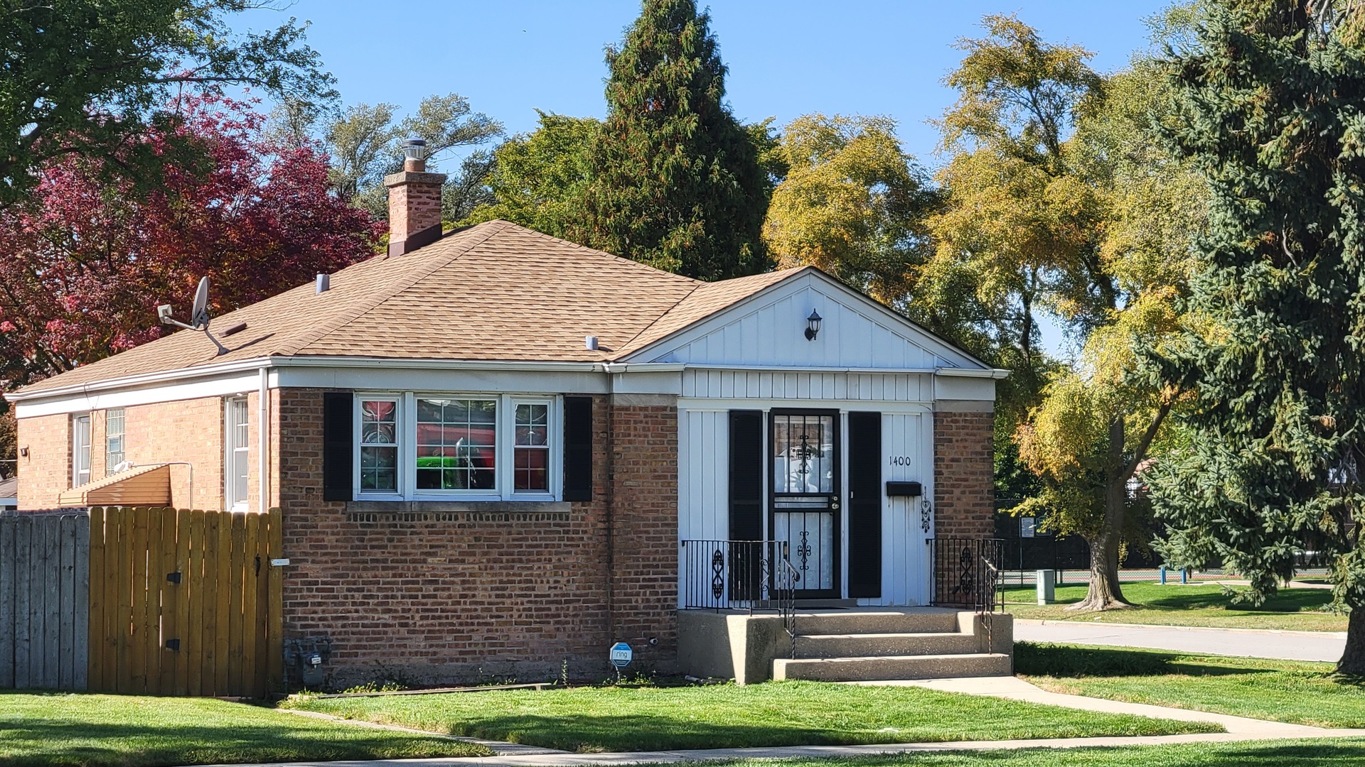 1400 Gardner Road Westchester, IL 60154 - Photo 2 of 12 a front view of a house with a yard