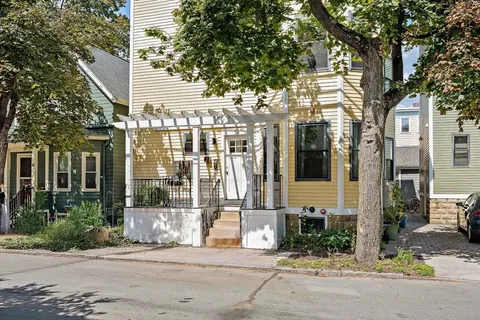 a front view of a building with street view
