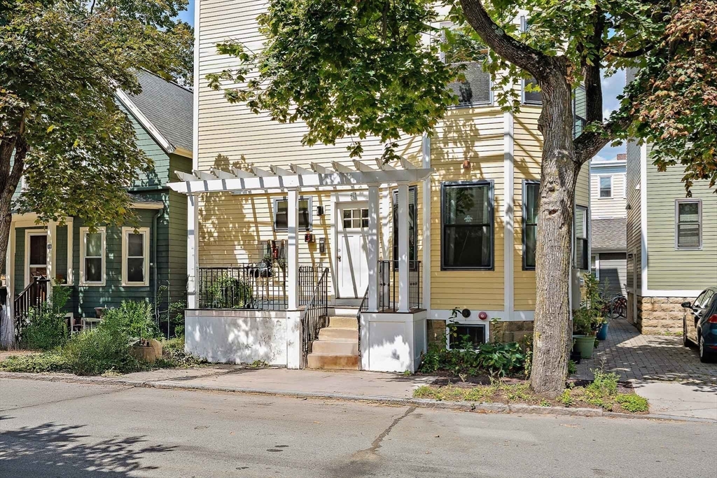 51 Dudley Street, Unit 2 Cambridge, MA 02140 - Photo 2 of 25 a front view of a building with street view