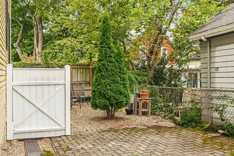 a house with trees in front of it