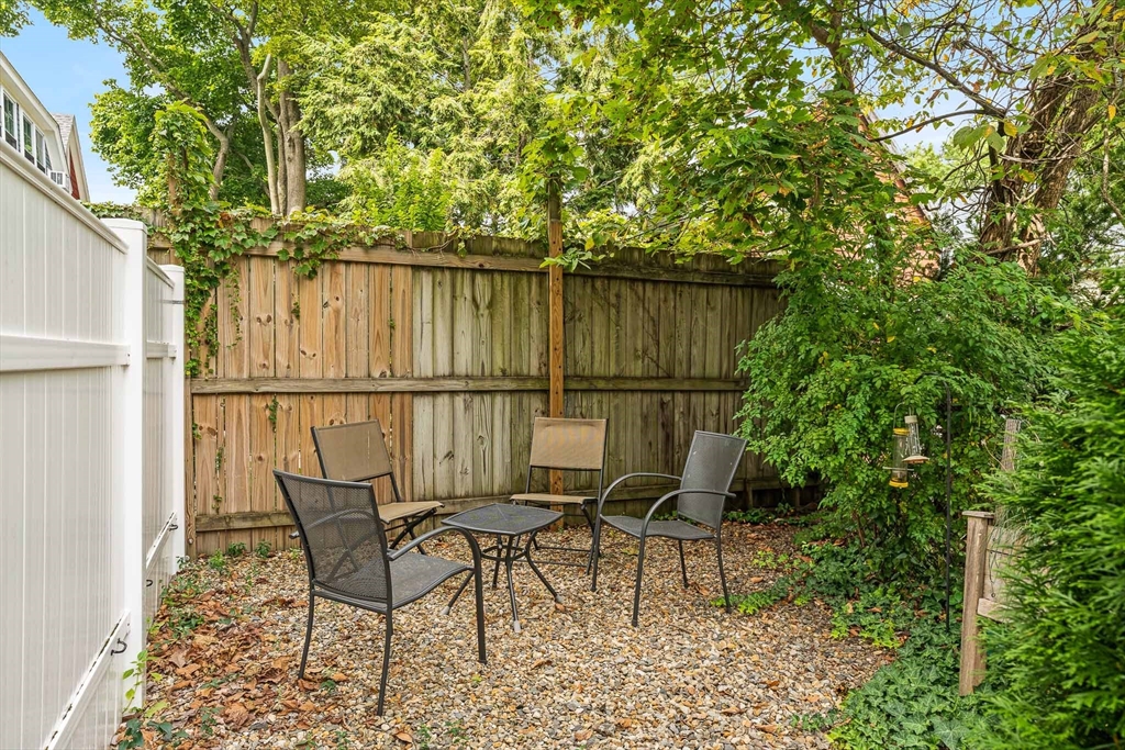 51 Dudley Street, Unit 2 Cambridge, MA 02140 - Photo 24 of 25 a garden view with a seating space