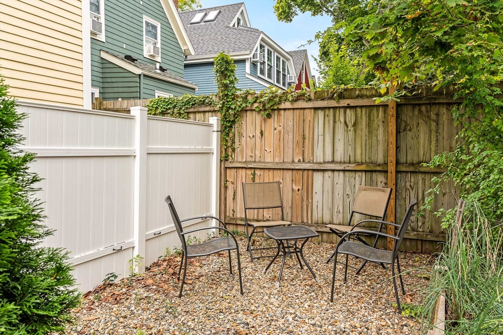 51 Dudley Street, Unit 2 Cambridge, MA 02140 - Photo 25 of 25 a view of a chairs and table in the balcony