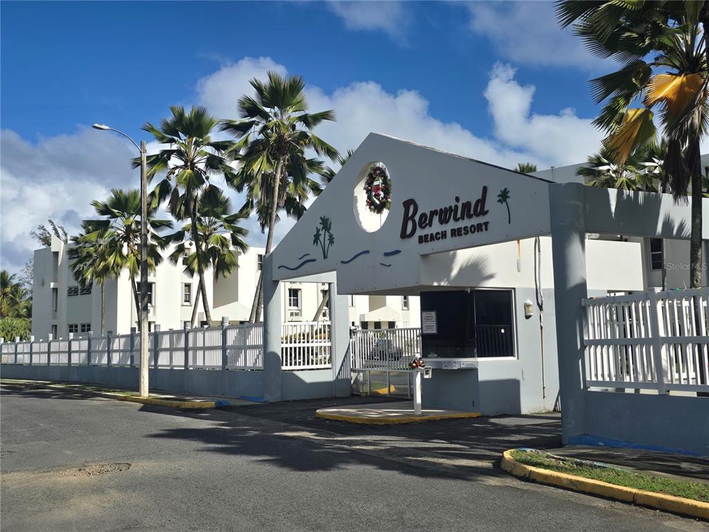 187 Cond Berwind Beach, Unit A172 Rio Grande, PR 00745 - Photo 1 of 1 a view of a building with a tree