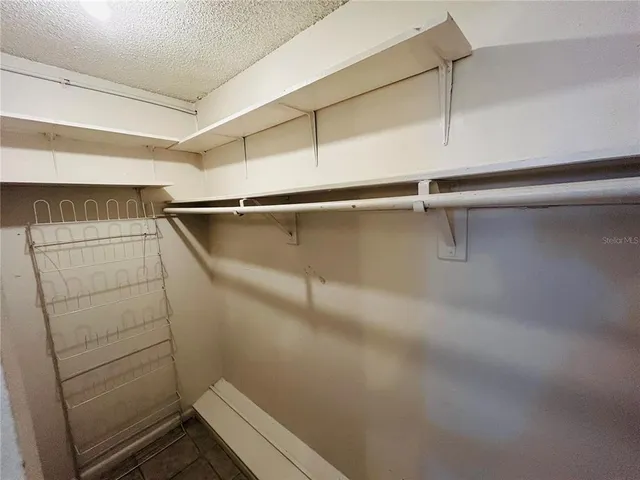 a view of a room with racks on the wall