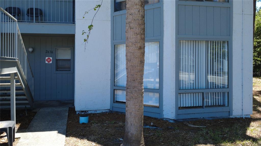 2636 Lemon Tree Lane, Unit 2636 Orlando, FL 32839 - Photo 12 of 51 a view of front door of a house
