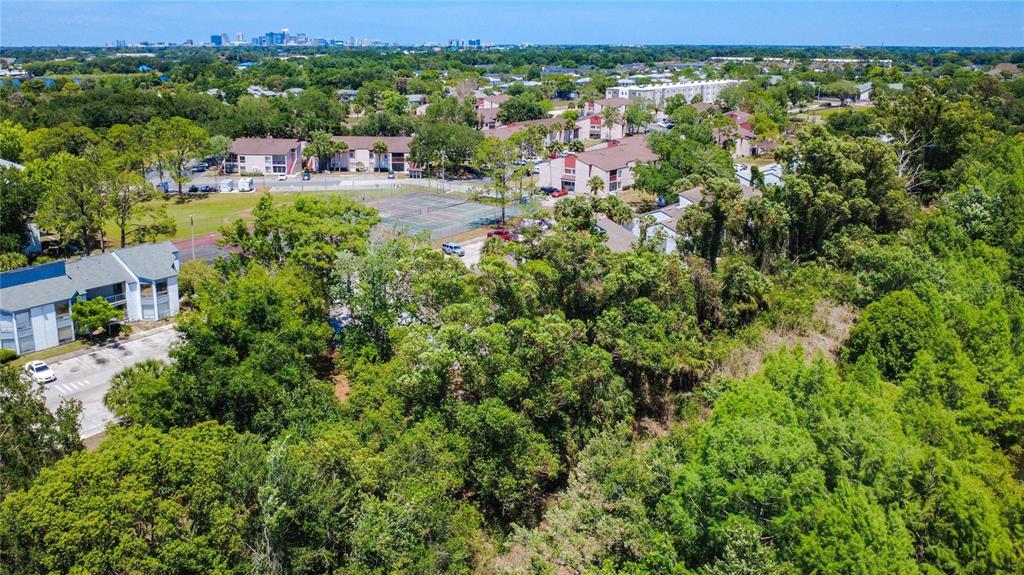 2636 Lemon Tree Lane, Unit 2636 Orlando, FL 32839 - Photo 42 of 51 an aerial view of multiple house