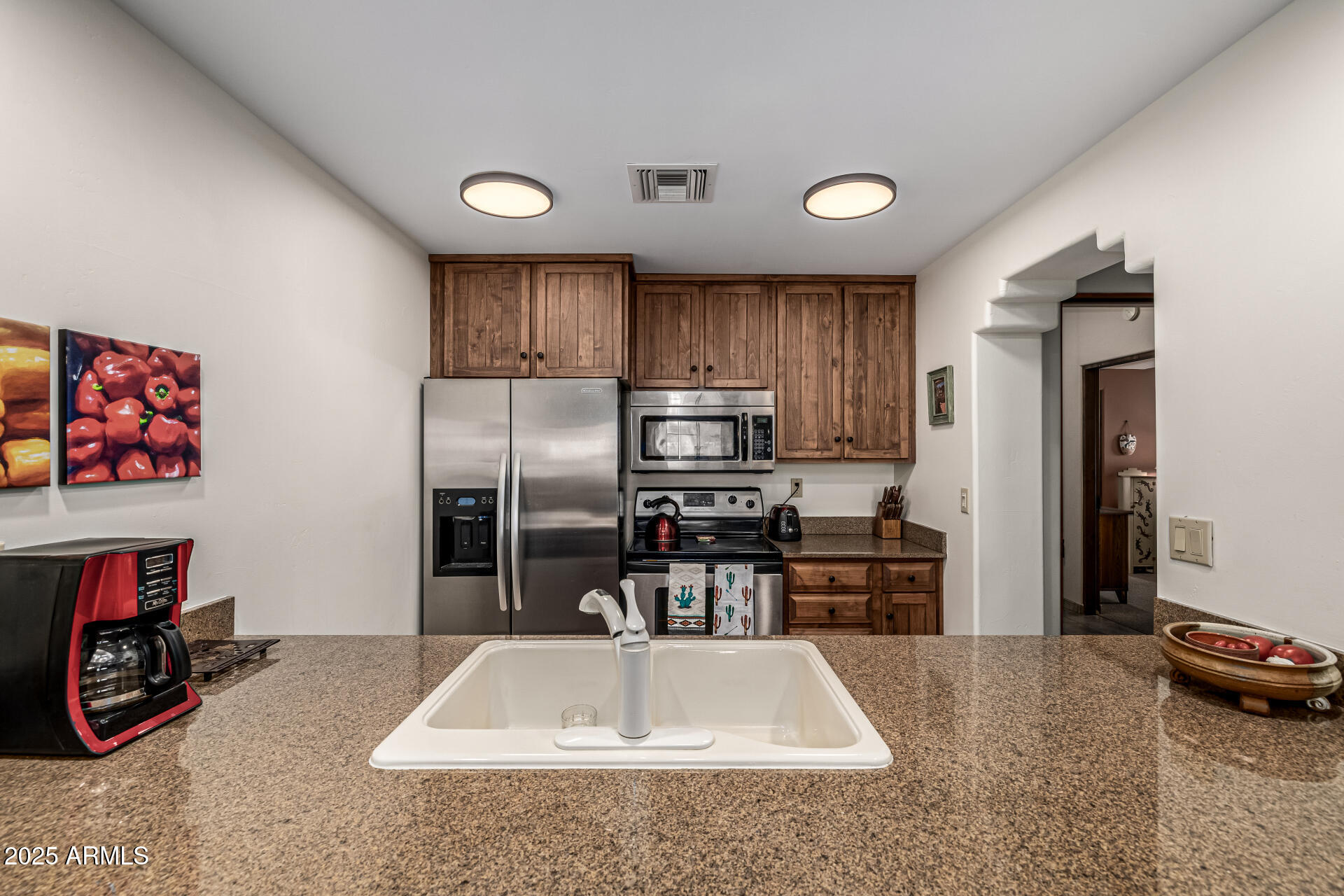 36601 North Mule Train Road, Unit C33 Carefree, AZ 85377 - Photo 15 of 61 a view of kitchen with refrigerator sink and stove