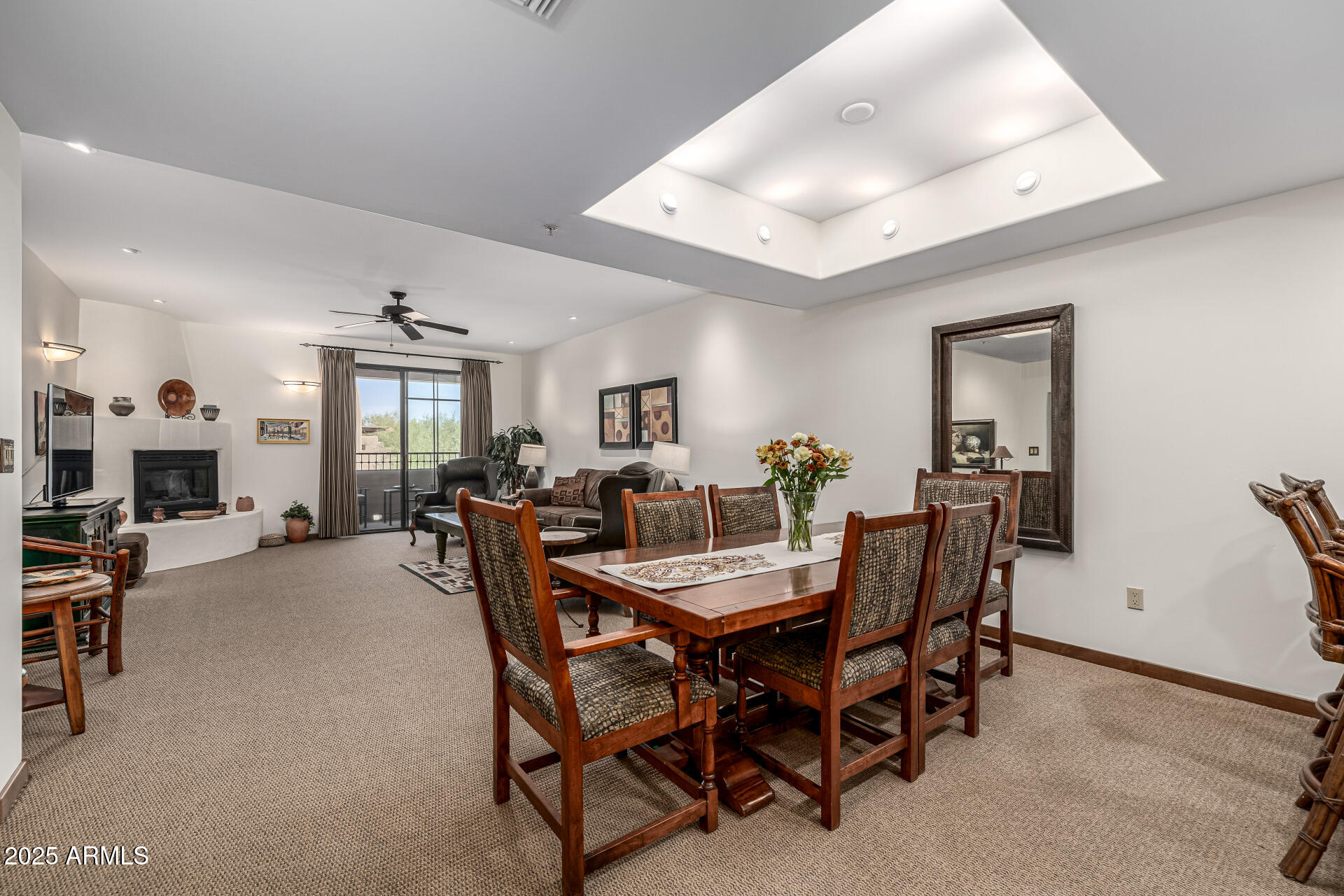 36601 North Mule Train Road, Unit C33 Carefree, AZ 85377 - Photo 18 of 61 a view of a dining room with furniture and chandelier