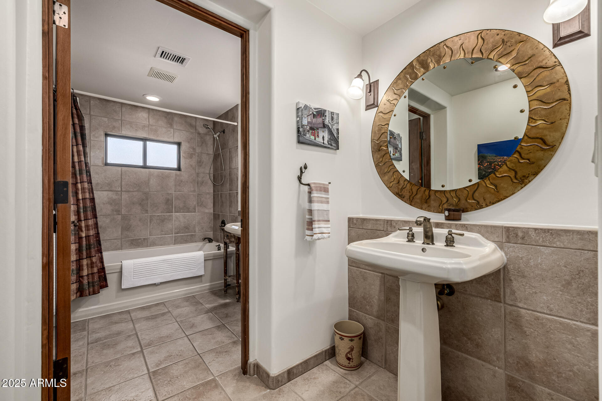 36601 North Mule Train Road, Unit C33 Carefree, AZ 85377 - Photo 25 of 61 a bathroom with a sink and a mirror