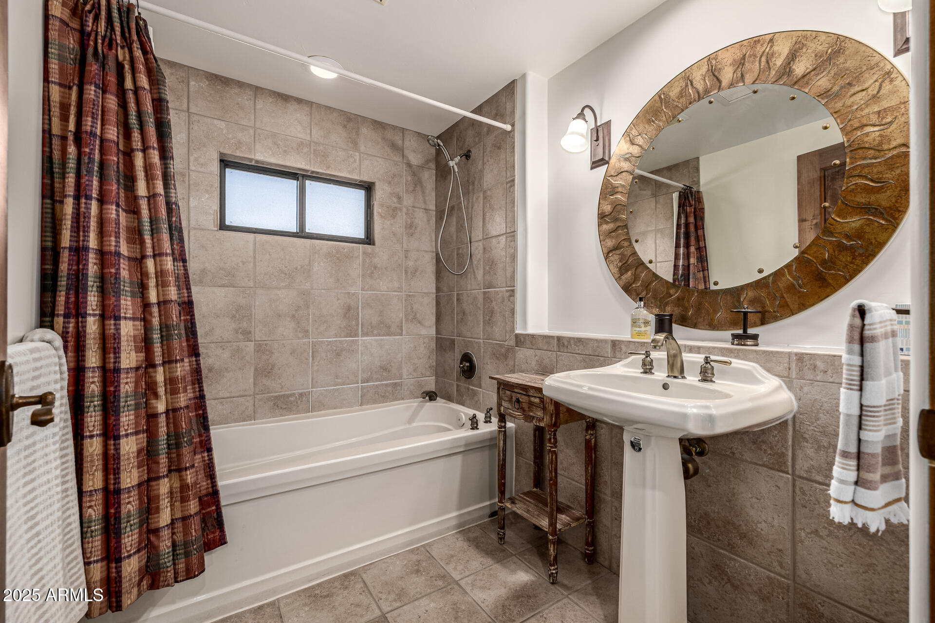 36601 North Mule Train Road, Unit C33 Carefree, AZ 85377 - Photo 26 of 61 a bathroom with a sink and a mirror
