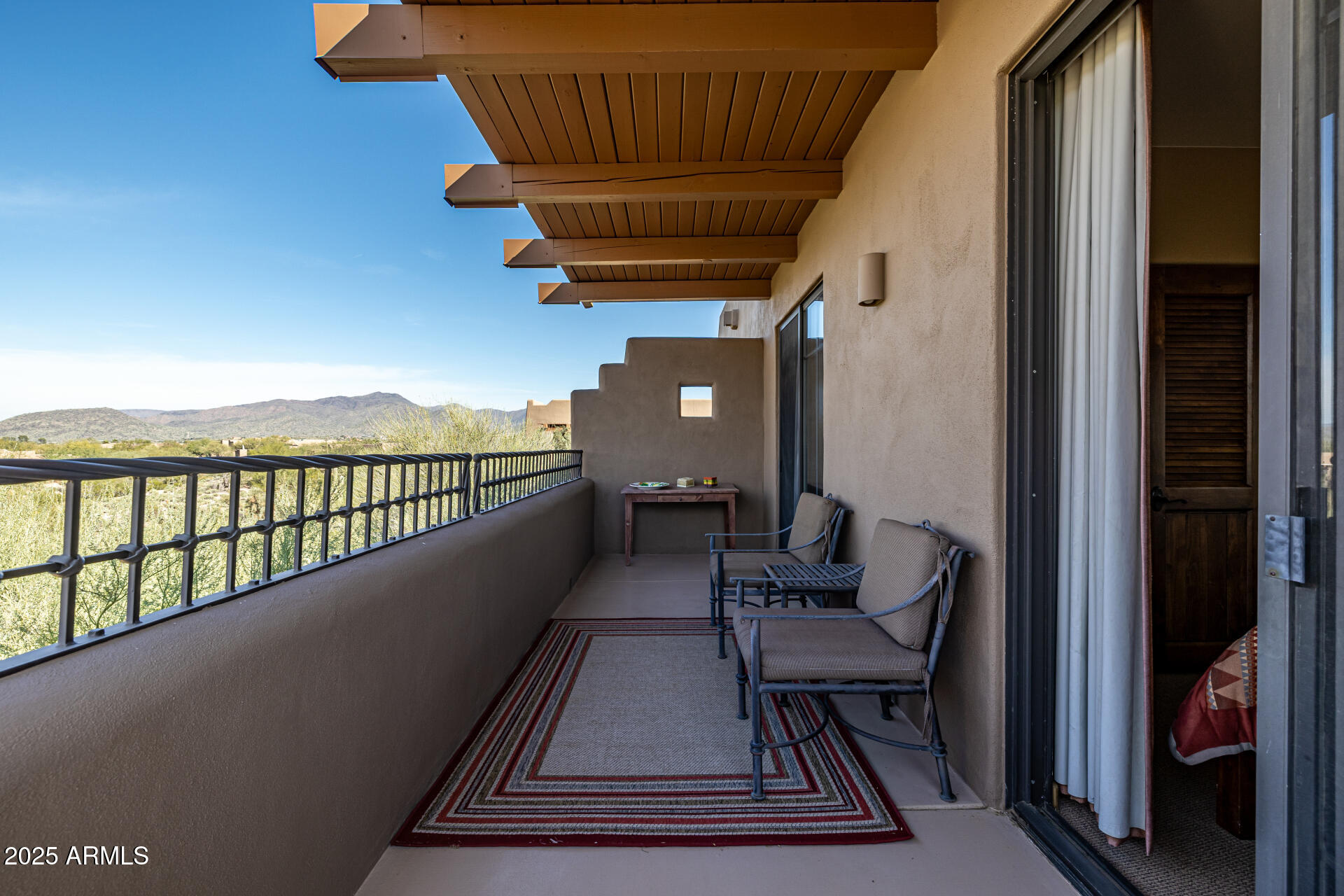 36601 North Mule Train Road, Unit C33 Carefree, AZ 85377 - Photo 31 of 61 a view of balcony with furniture
