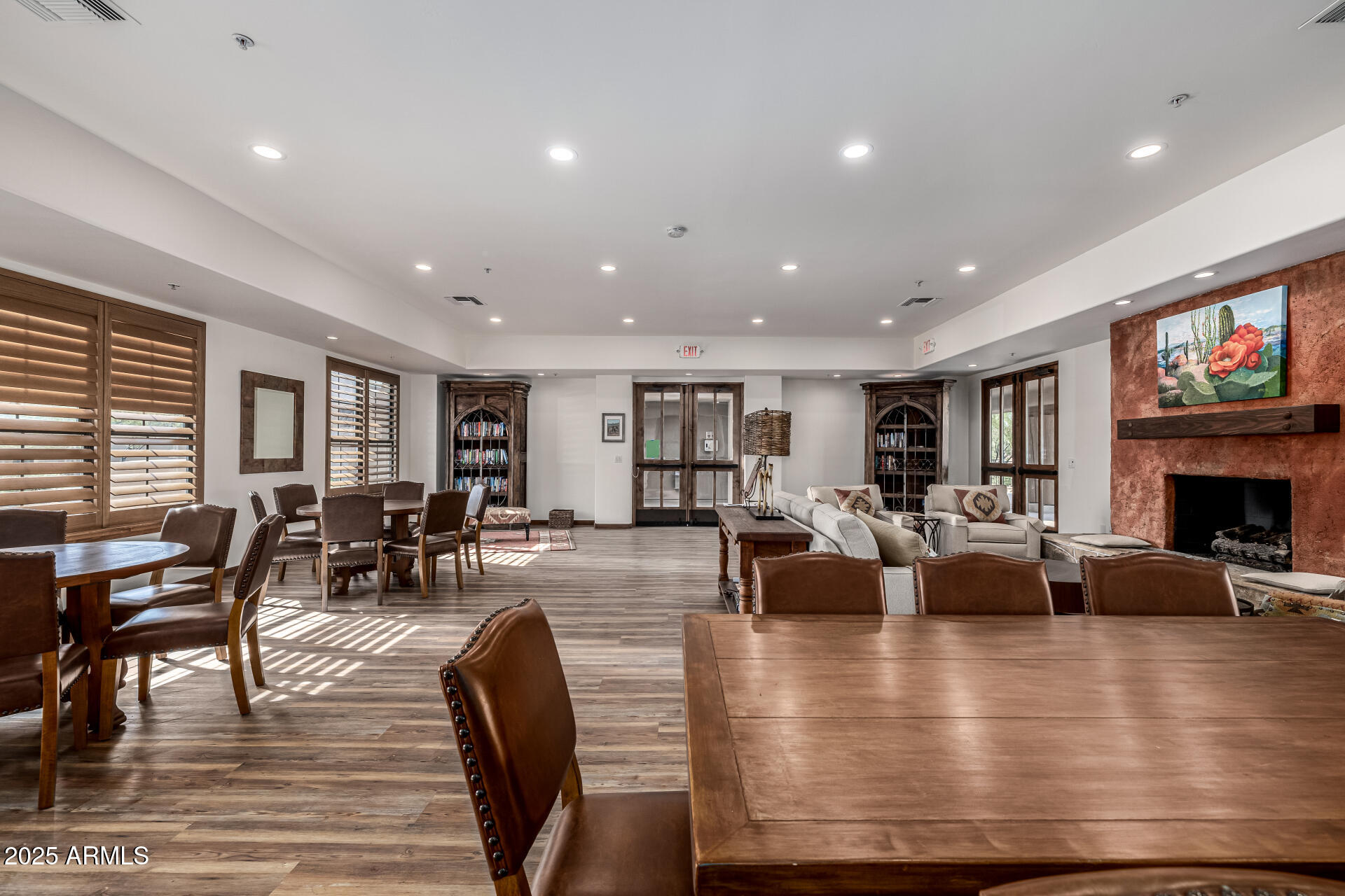 36601 North Mule Train Road, Unit C33 Carefree, AZ 85377 - Photo 38 of 61 a living room with fireplace furniture and a wooden floor