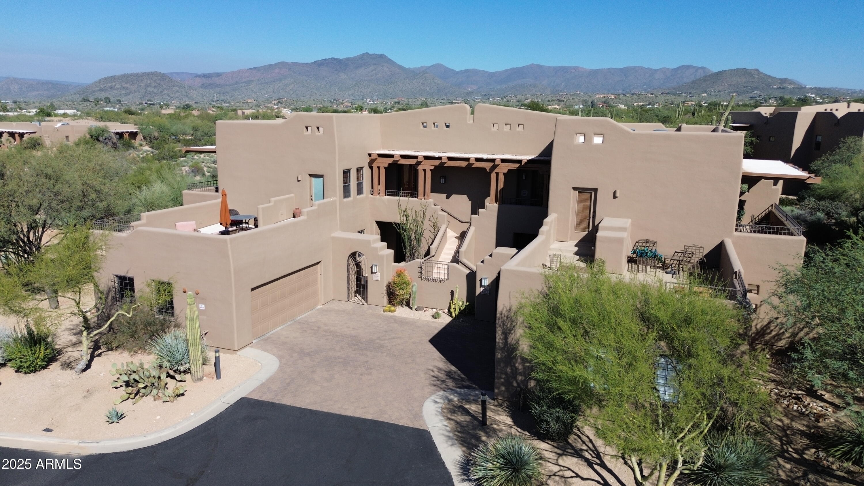 36601 North Mule Train Road, Unit C33 Carefree, AZ 85377 - Photo 41 of 61 an aerial view of a house with a mountain