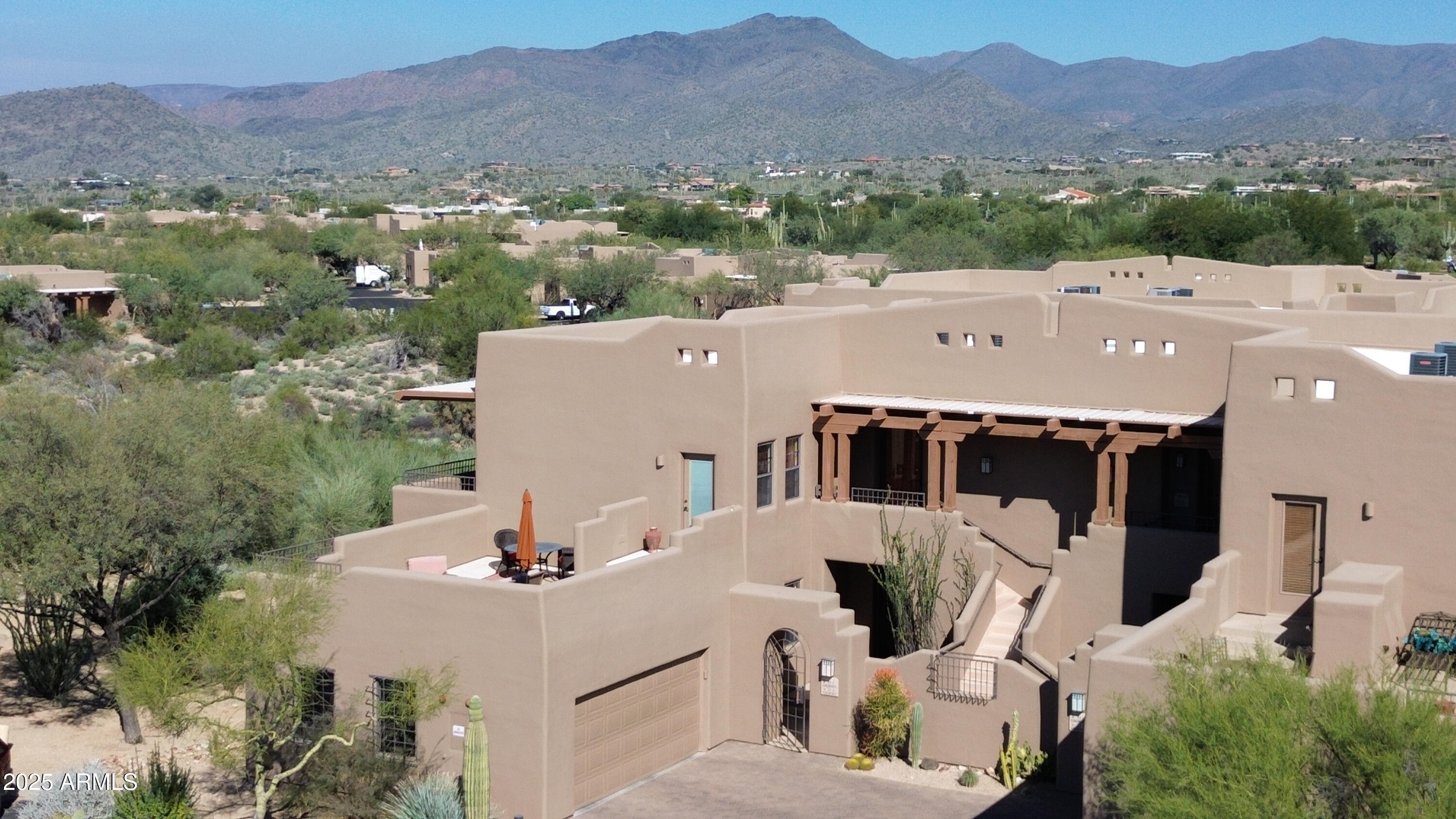 36601 North Mule Train Road, Unit C33 Carefree, AZ 85377 - Photo 42 of 61 an aerial view of a house with a mountain view