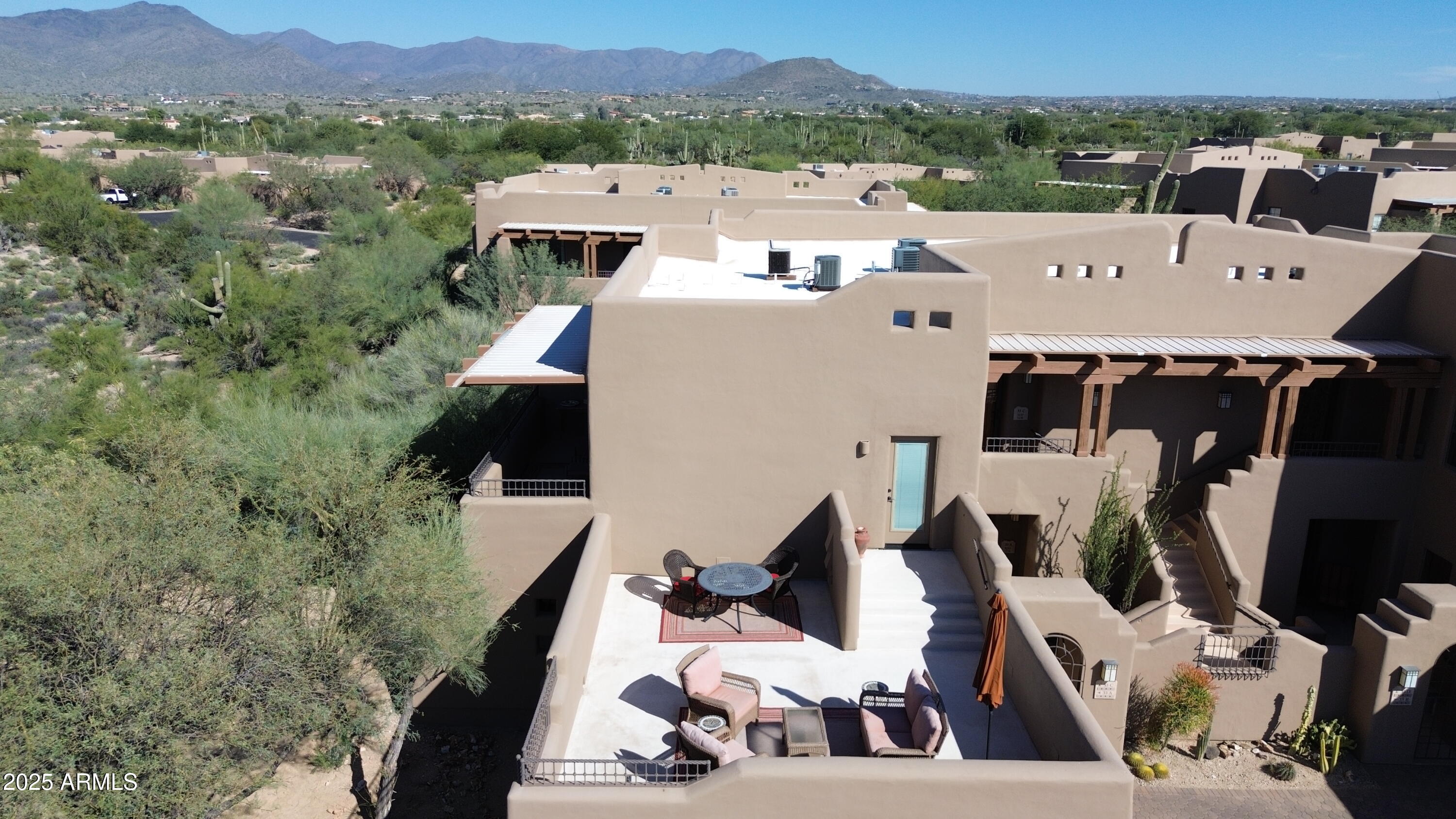 36601 North Mule Train Road, Unit C33 Carefree, AZ 85377 - Photo 43 of 61 an aerial view of a house with a yard