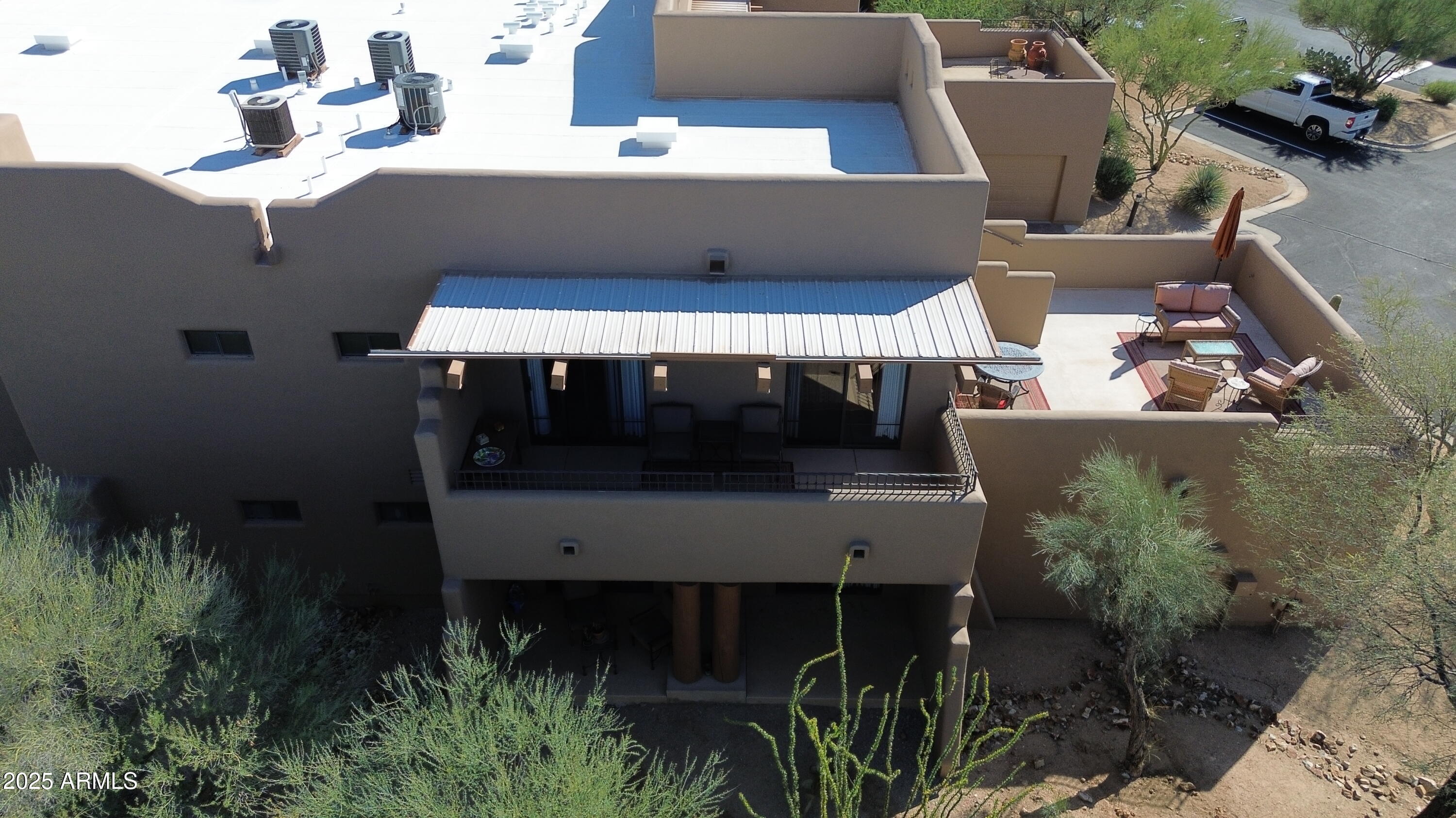 36601 North Mule Train Road, Unit C33 Carefree, AZ 85377 - Photo 44 of 61 an aerial view of a house with yard