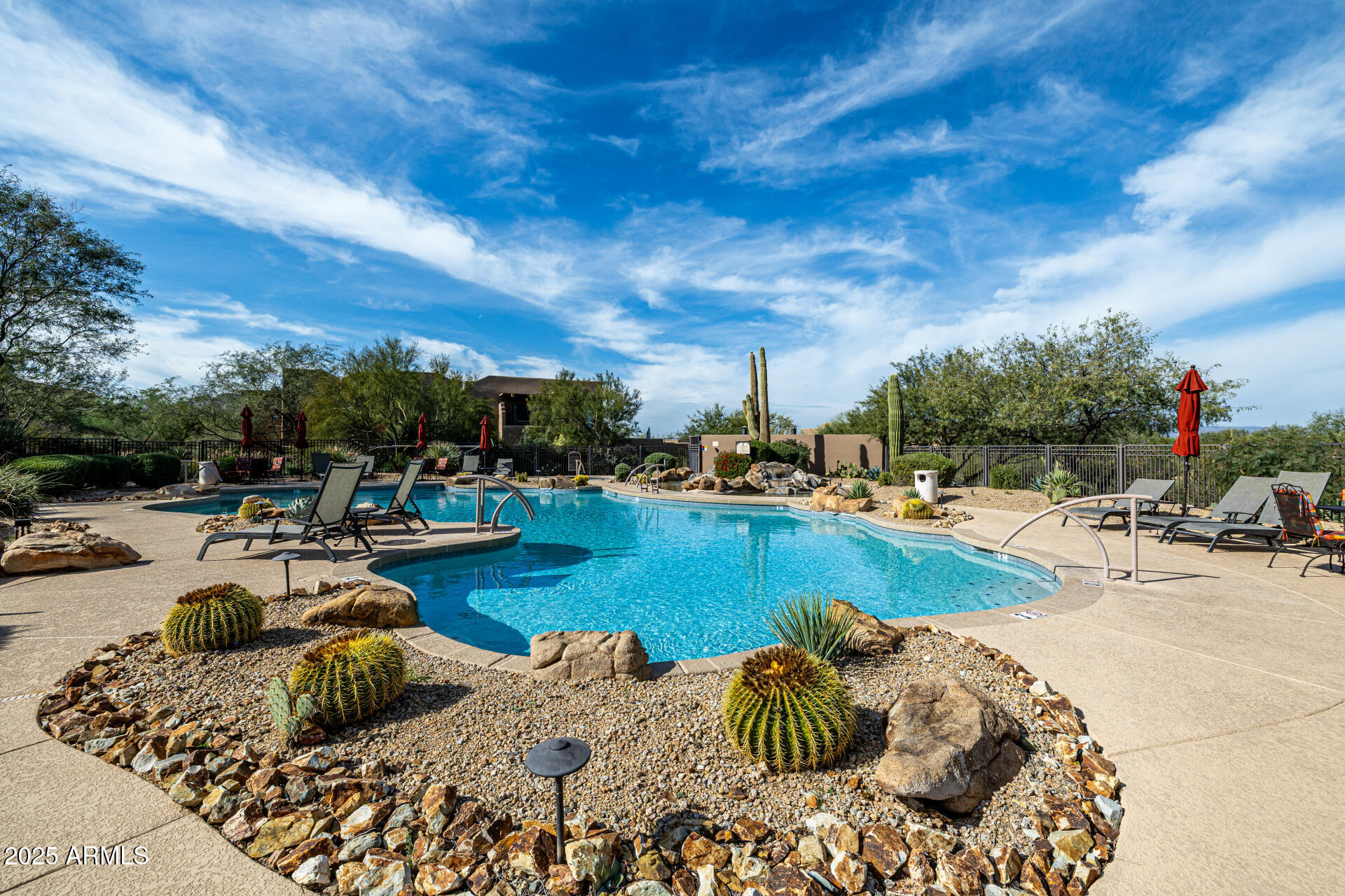 36601 North Mule Train Road, Unit C33 Carefree, AZ 85377 - Photo 48 of 61 a view of swimming pool with outdoor seating
