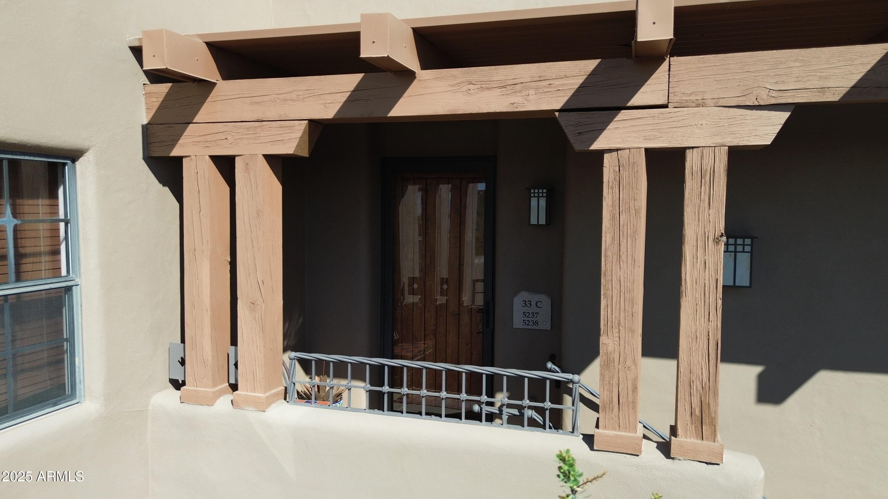 36601 North Mule Train Road, Unit C33 Carefree, AZ 85377 - Photo 5 of 61 a view of balcony with furniture