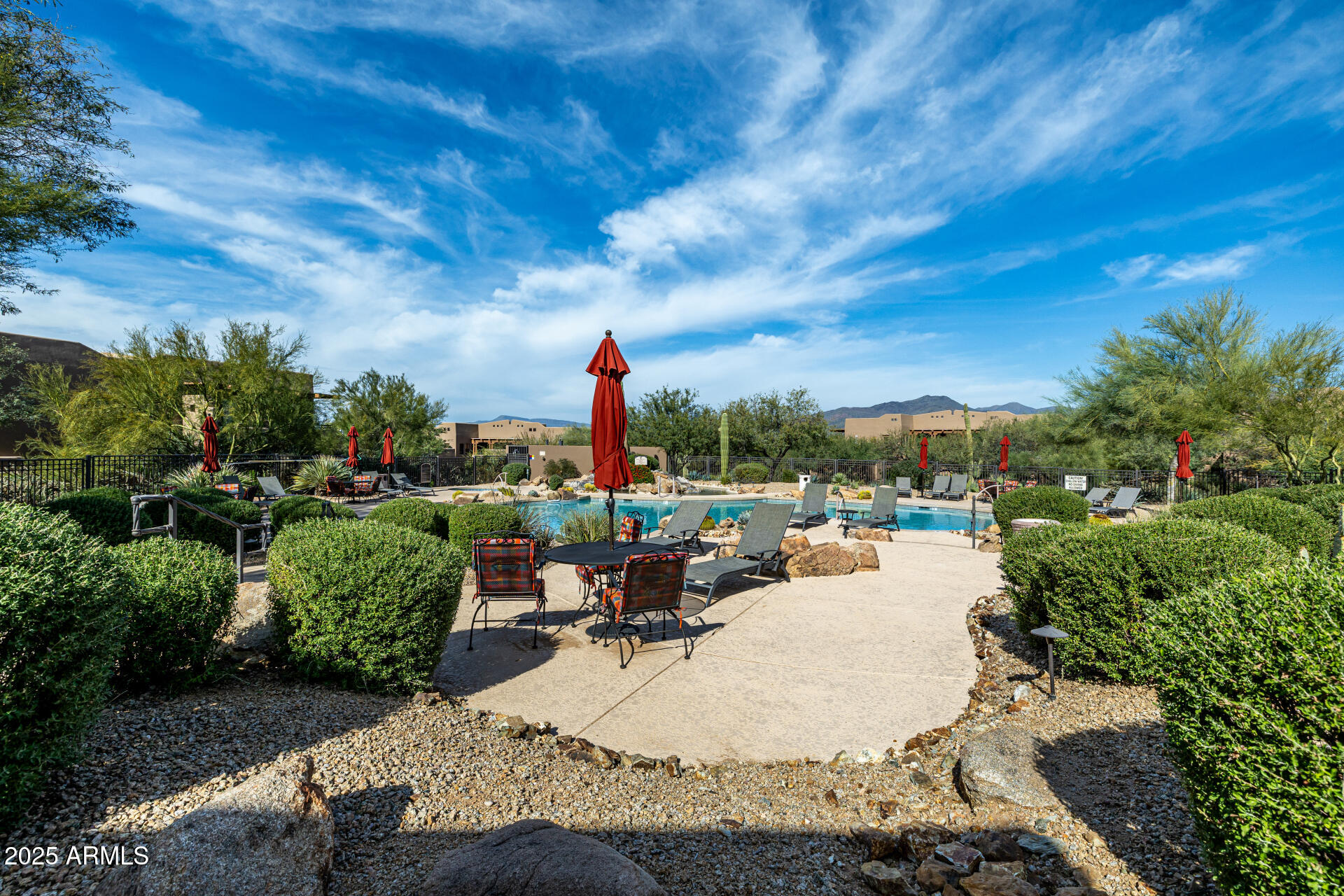 36601 North Mule Train Road, Unit C33 Carefree, AZ 85377 - Photo 51 of 61 a view of a terrace with sitting area
