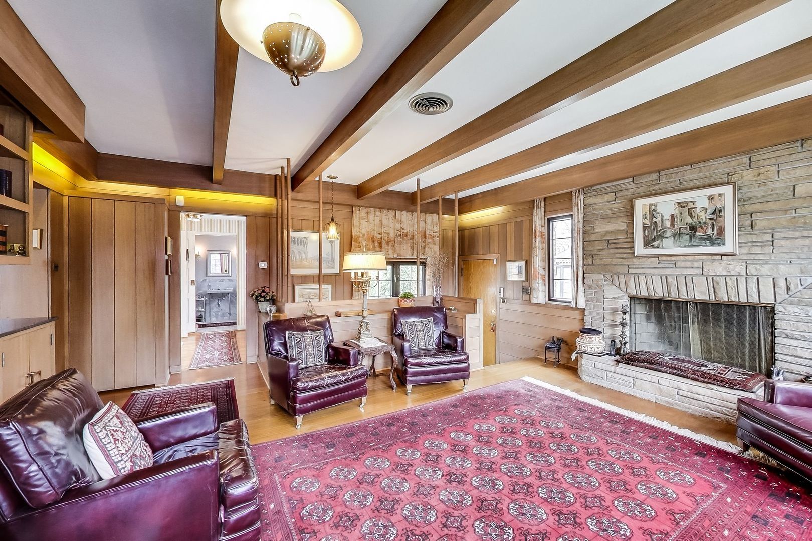 634 North Merrill Street Park Ridge, IL 60068 - Photo 14 of 28 a living room with furniture a fireplace and a large window
