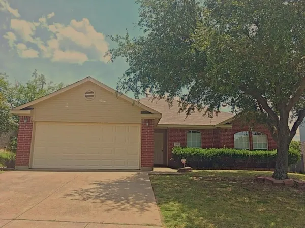 front view of house with a yard