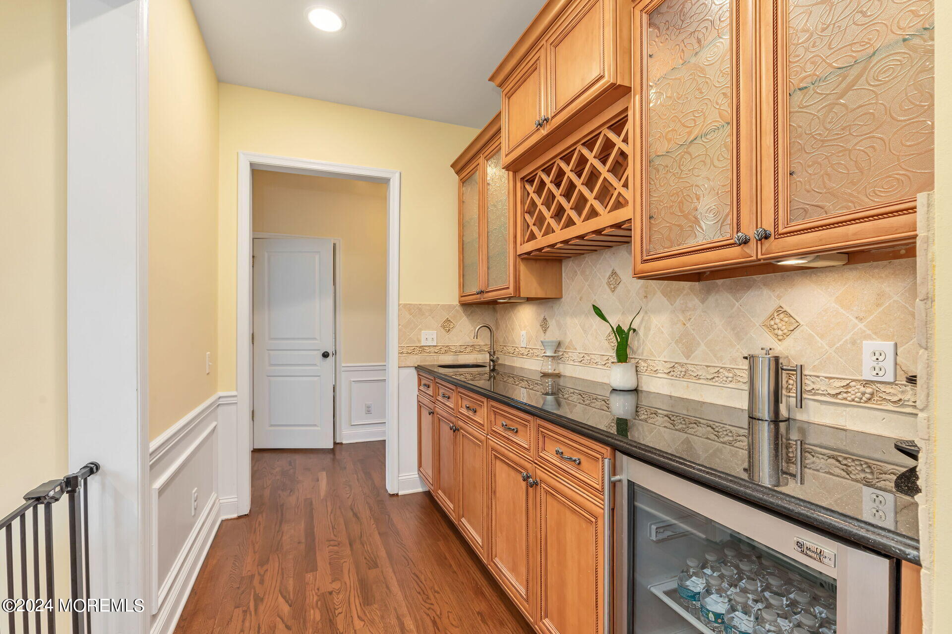 20 Crape Myrtle Drive Holmdel, NJ 07733 - Photo 12 of 53 a kitchen with granite countertop stainless steel appliances a sink and cabinets