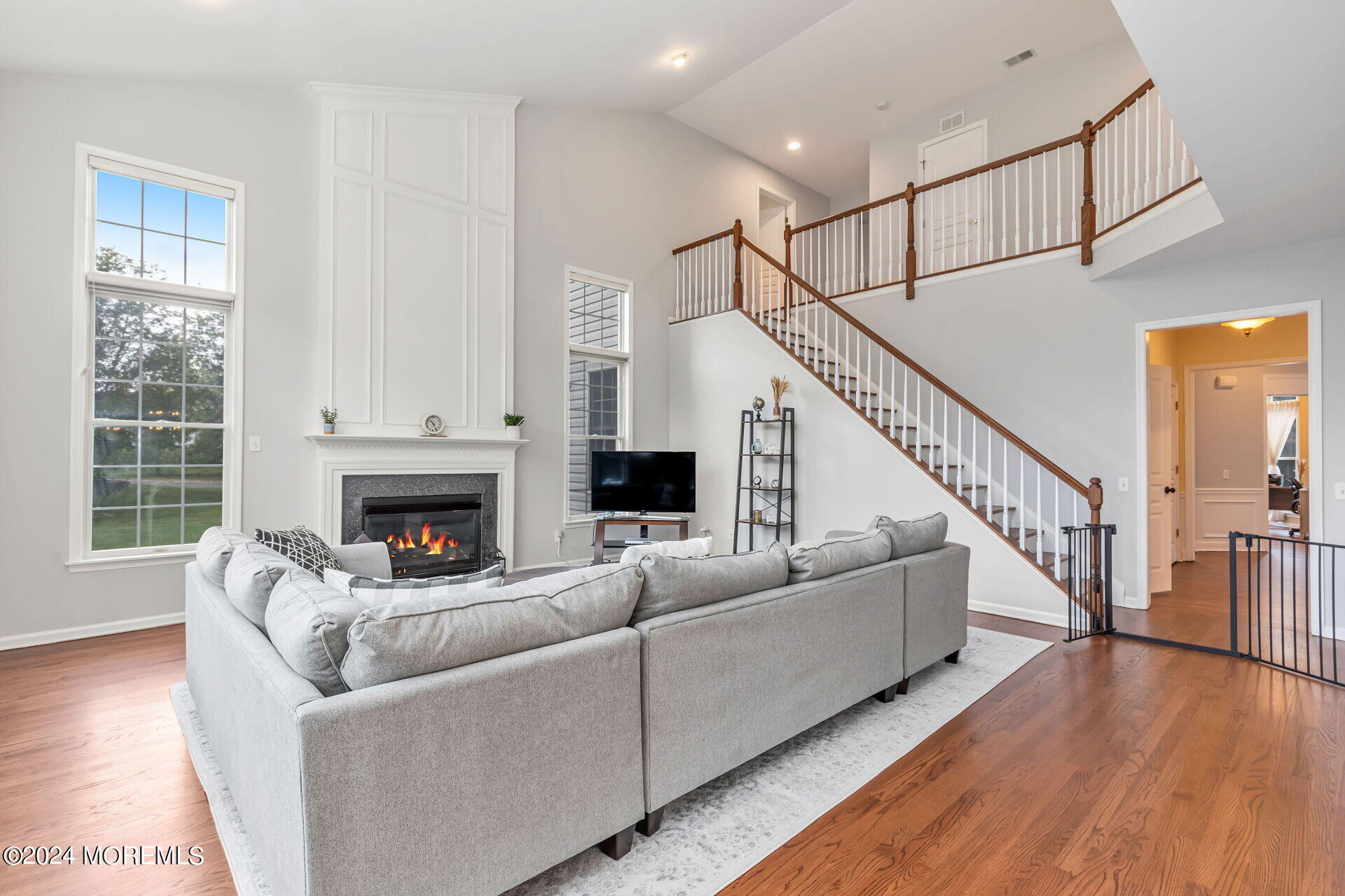 20 Crape Myrtle Drive Holmdel, NJ 07733 - Photo 13 of 53 a living room with furniture and a fireplace