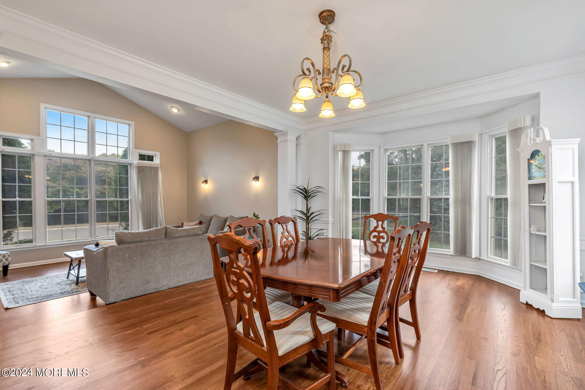 20 Crape Myrtle Drive Holmdel, NJ 07733 - Photo 18 of 53 a view of a dining room with furniture wooden floor and chandelier
