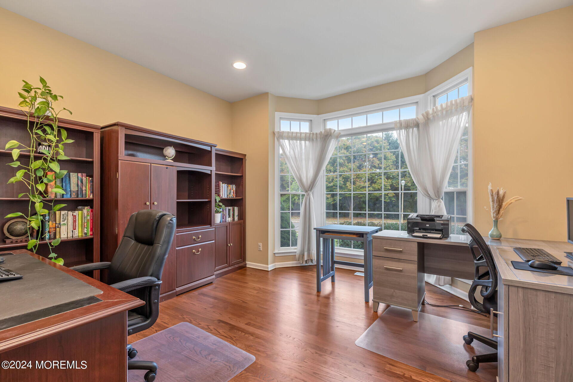 20 Crape Myrtle Drive Holmdel, NJ 07733 - Photo 20 of 53 a view of a livingroom with furniture and a window