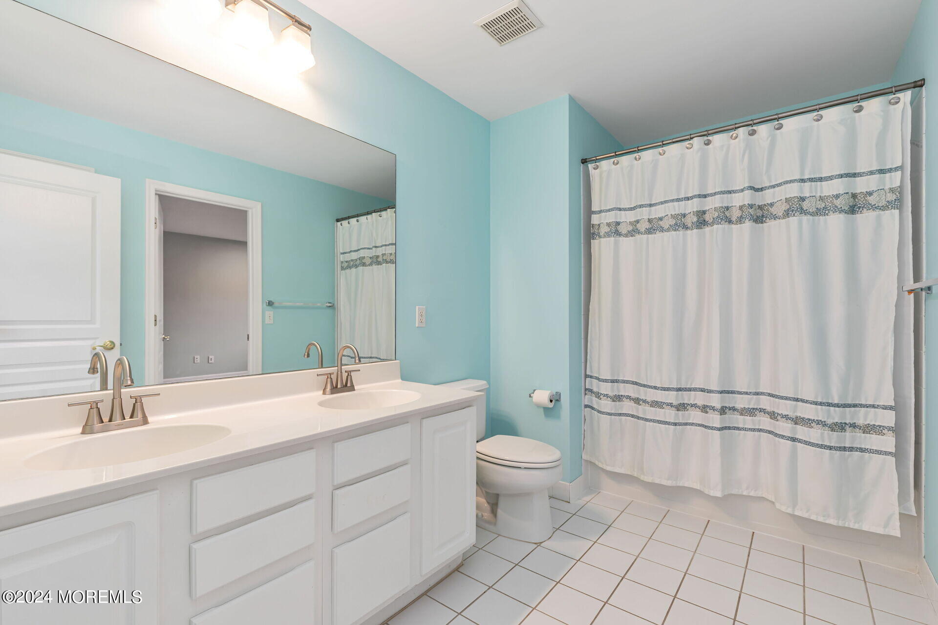 20 Crape Myrtle Drive Holmdel, NJ 07733 - Photo 27 of 53 a bathroom with a double vanity sink mirror and toilet