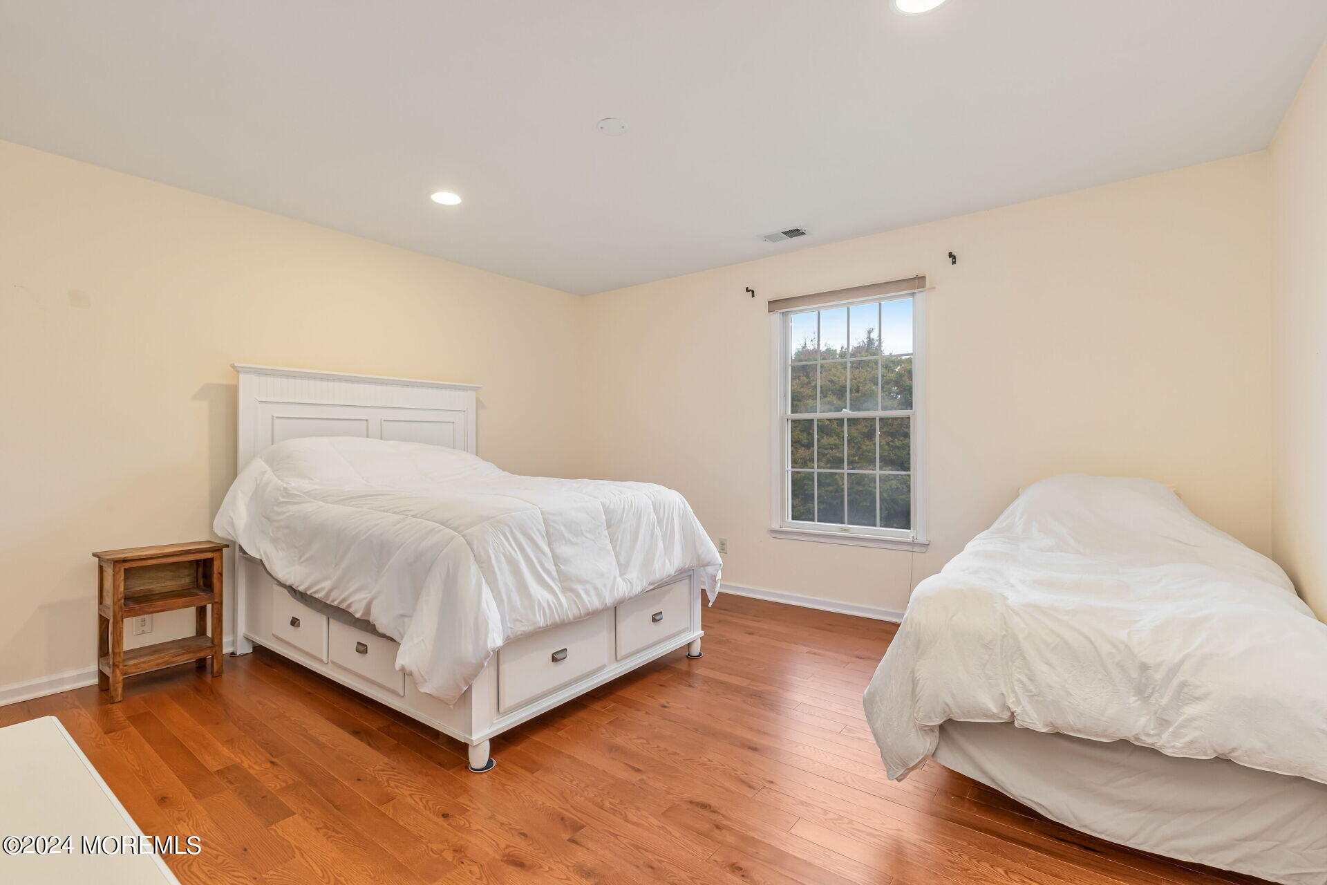 20 Crape Myrtle Drive Holmdel, NJ 07733 - Photo 29 of 53 a bed sitting in a spacious bedroom next to a window