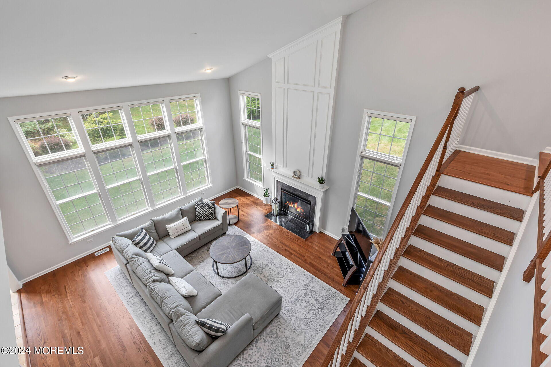 20 Crape Myrtle Drive Holmdel, NJ 07733 - Photo 31 of 53 a living room with furniture and a window