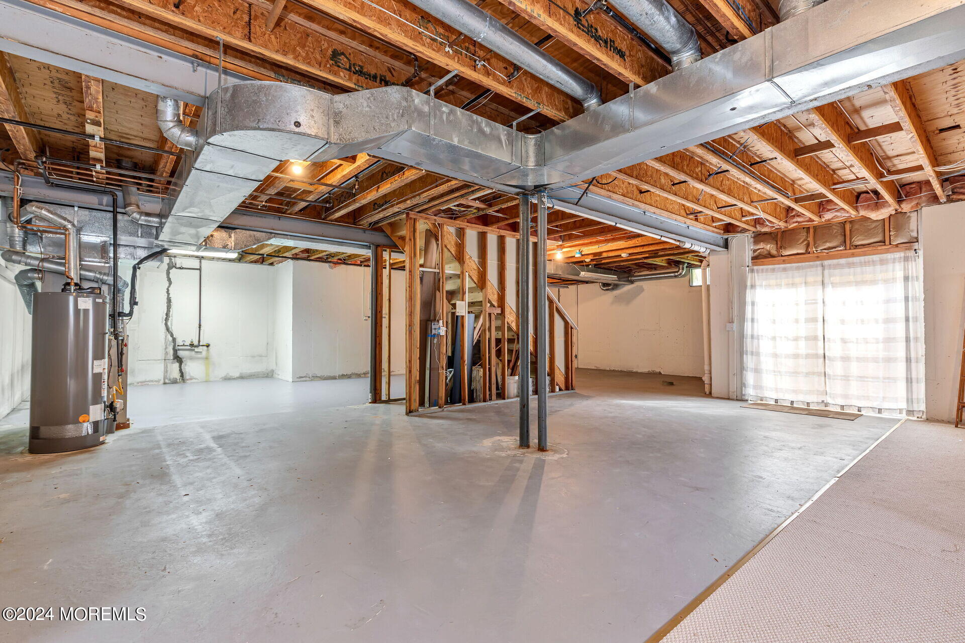 20 Crape Myrtle Drive Holmdel, NJ 07733 - Photo 36 of 53 a view of an empty room with wooden floor
