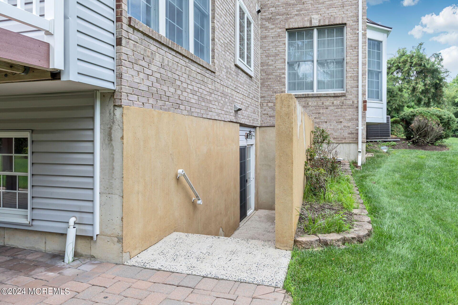 20 Crape Myrtle Drive Holmdel, NJ 07733 - Photo 39 of 53 a view of a pathway besides a house