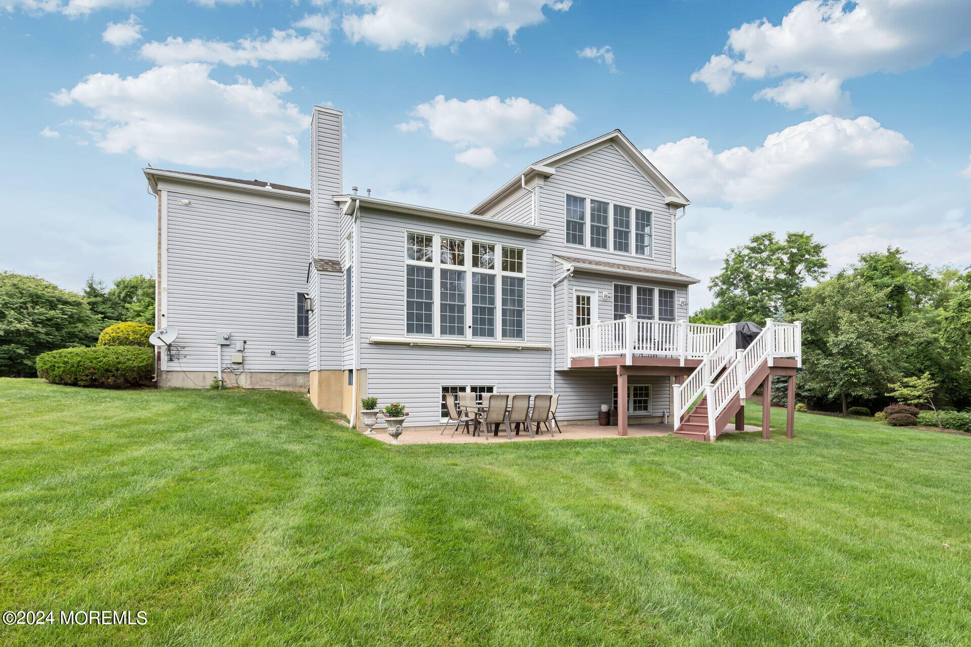 20 Crape Myrtle Drive Holmdel, NJ 07733 - Photo 41 of 53 a view of an house with backyard and porch