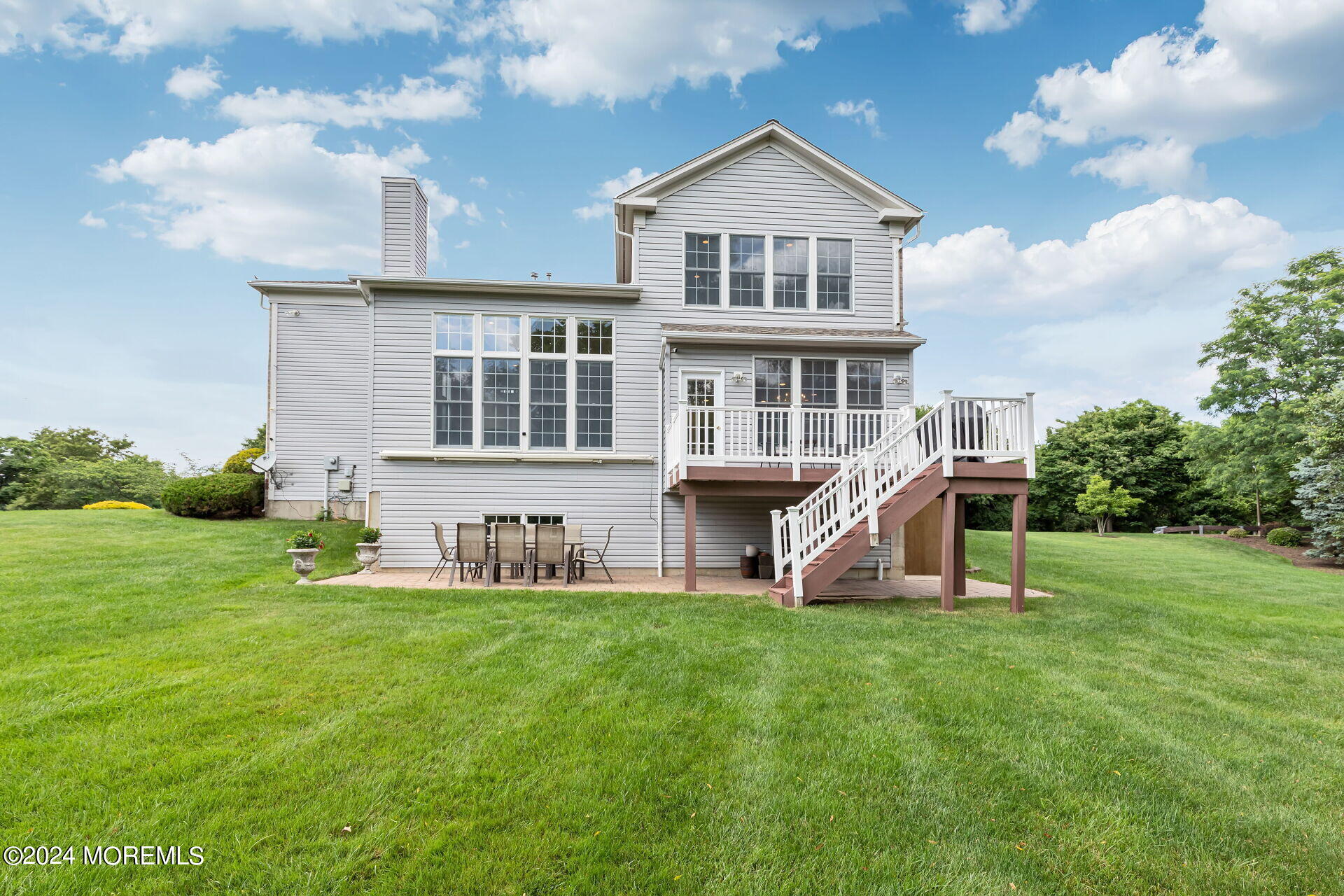 20 Crape Myrtle Drive Holmdel, NJ 07733 - Photo 42 of 53 a view of a house with a yard and sitting area