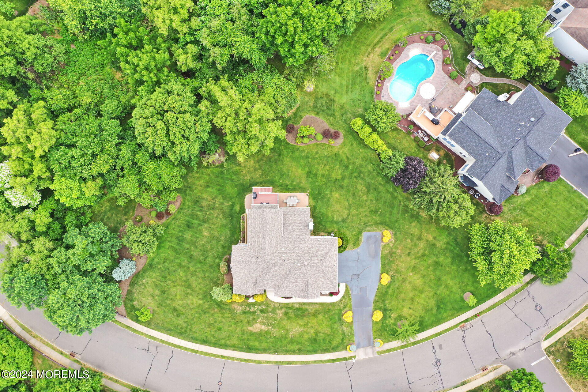 20 Crape Myrtle Drive Holmdel, NJ 07733 - Photo 48 of 53 an aerial view of a house with a garden and trees