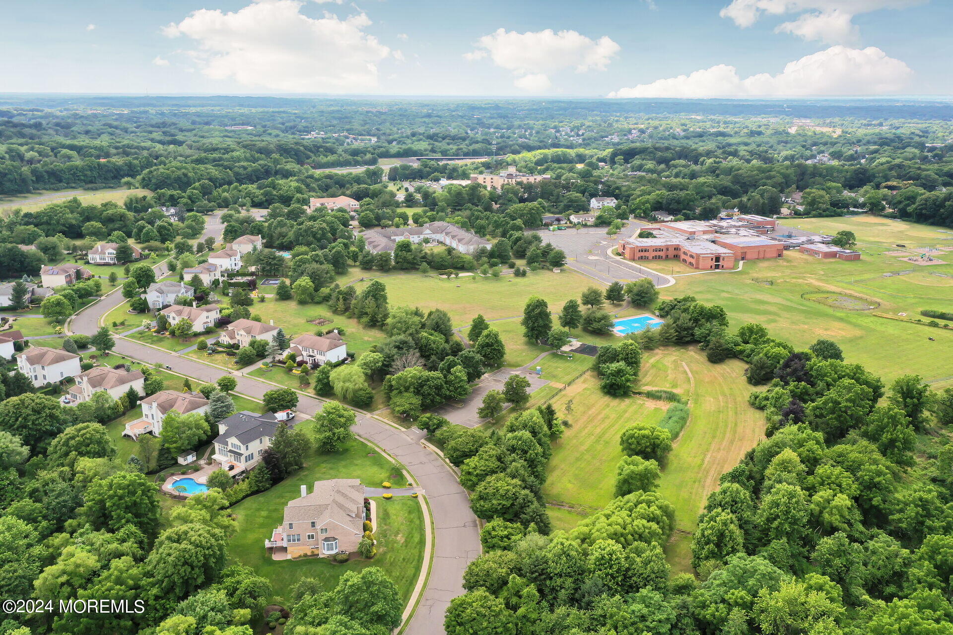 20 Crape Myrtle Drive Holmdel, NJ 07733 - Photo 49 of 53 an aerial view of residential houses with outdoor space and trees