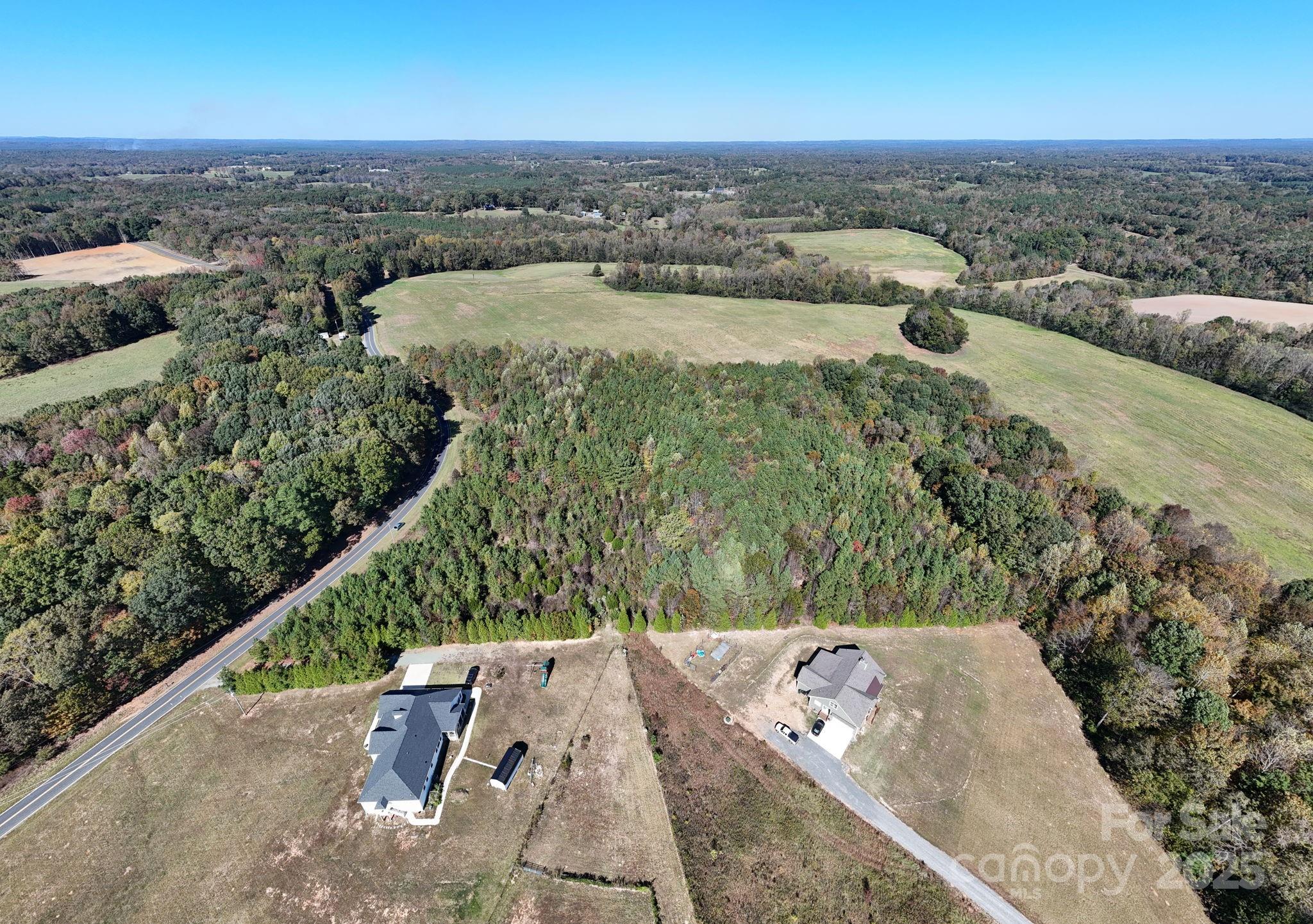 1117 Hoyt Scott Road Bear Creek, NC 27207 - Photo 16 of 16 an aerial view of a house with a yard