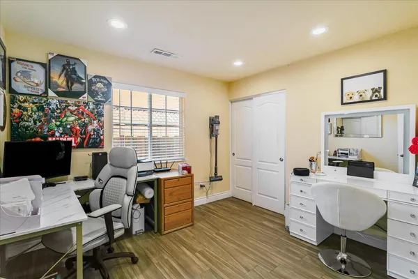 a workspace with furniture and window