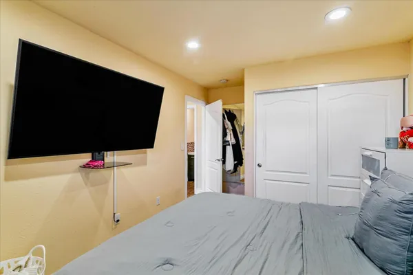 a view of a livingroom with a flat screen tv