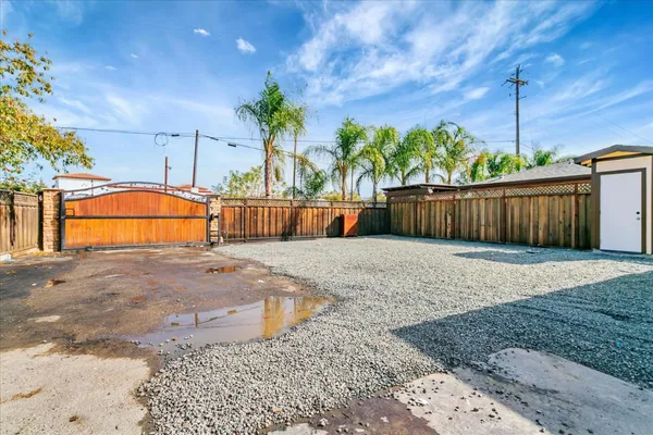 a view of a backyard with a slide