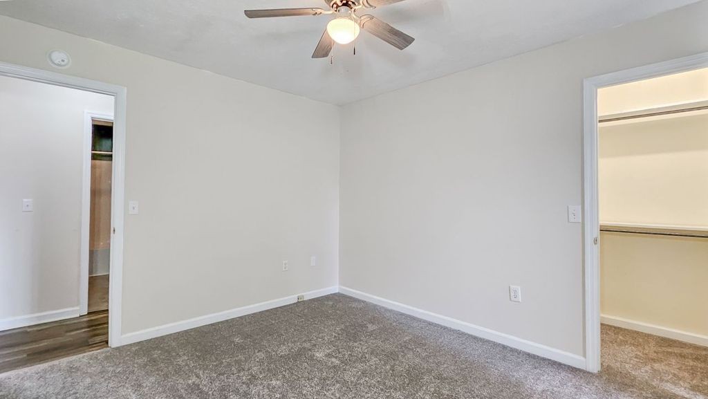11 Amberwood Road Fayetteville, TN 37334 - Photo 17 of 36 an empty room with a chandelier fan