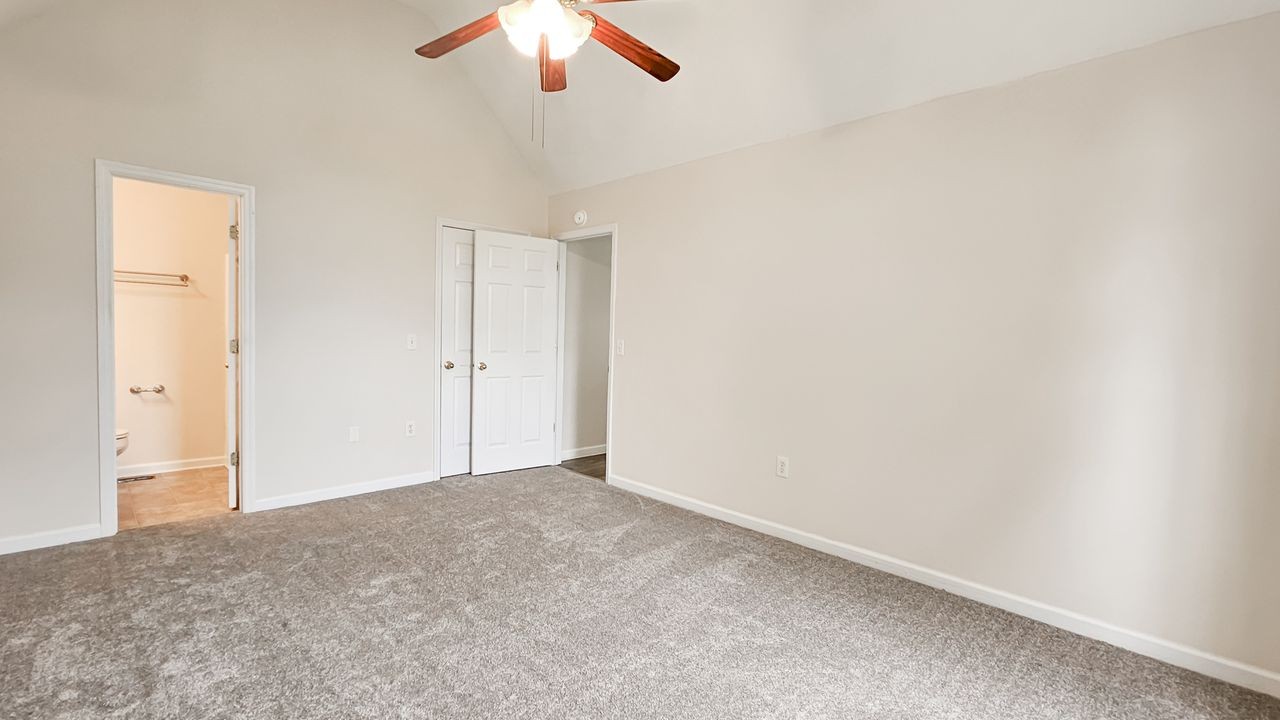 11 Amberwood Road Fayetteville, TN 37334 - Photo 24 of 36 an empty room with a empty space and a ceiling fan