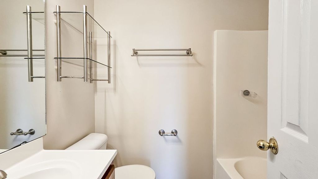 11 Amberwood Road Fayetteville, TN 37334 - Photo 29 of 36 a bathroom with a sink toilet and shower