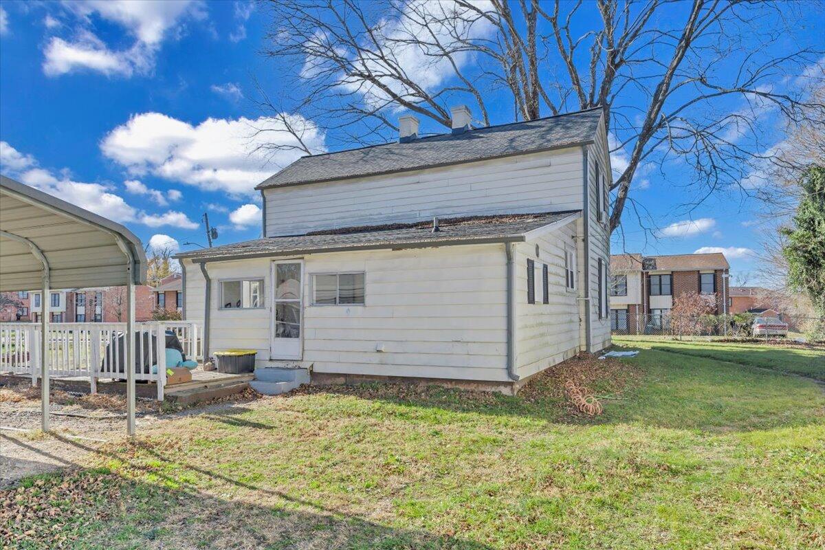 1319 Liberty Road Northeast Roanoke, VA 24012 - Photo 28 of 36 a view of a house with a yard
