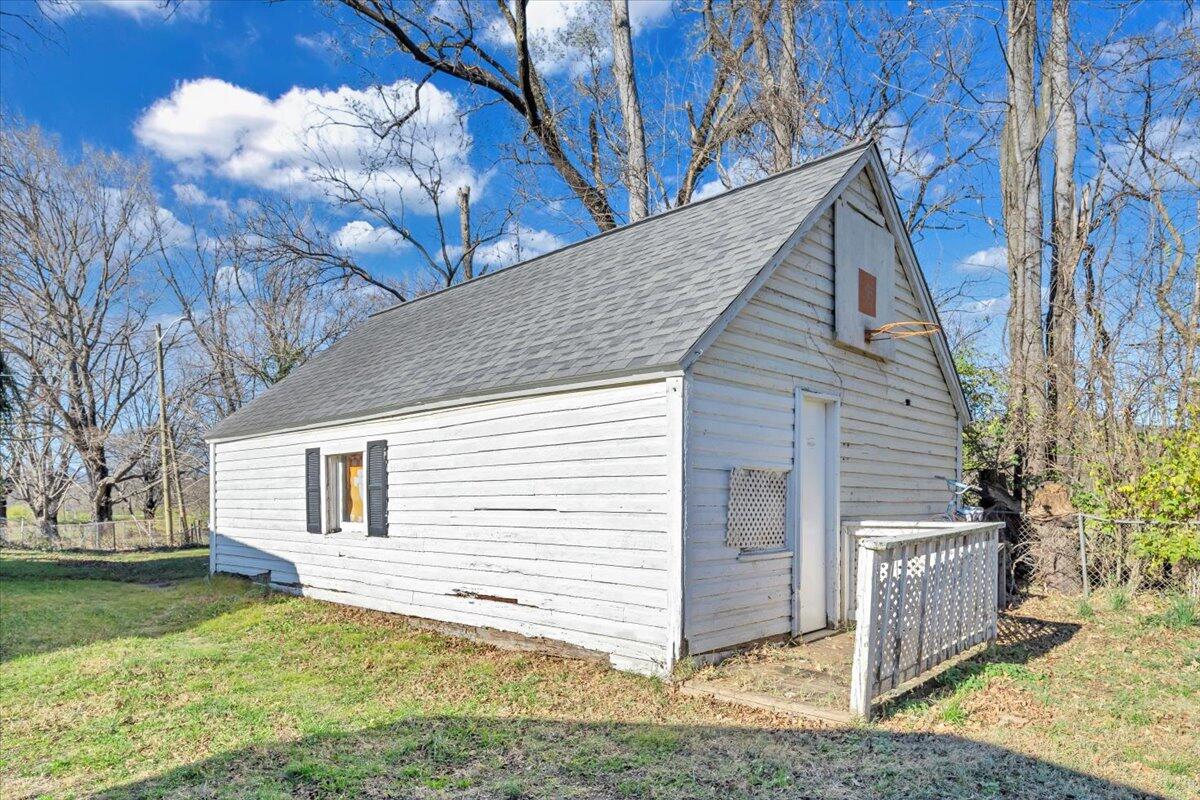 1319 Liberty Road Northeast Roanoke, VA 24012 - Photo 31 of 36 a view of a house with a yard
