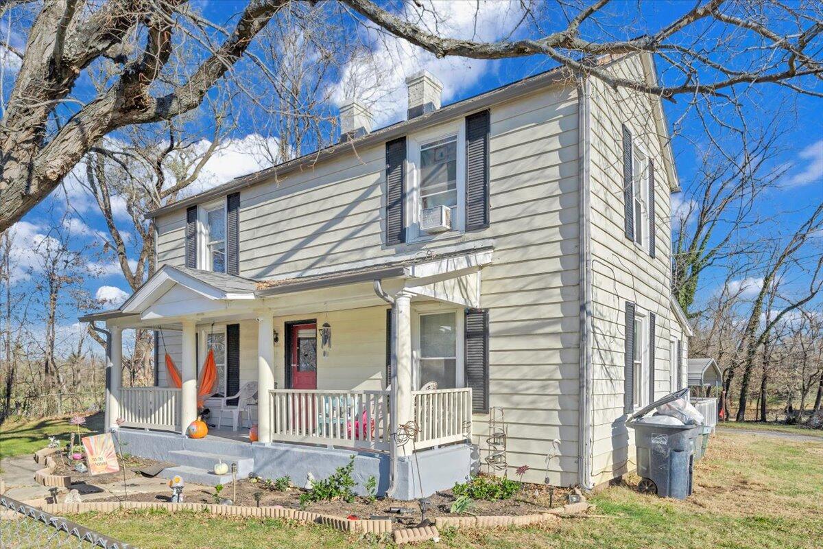 1319 Liberty Road Northeast Roanoke, VA 24012 - Photo 35 of 36 a front view of a house with garden