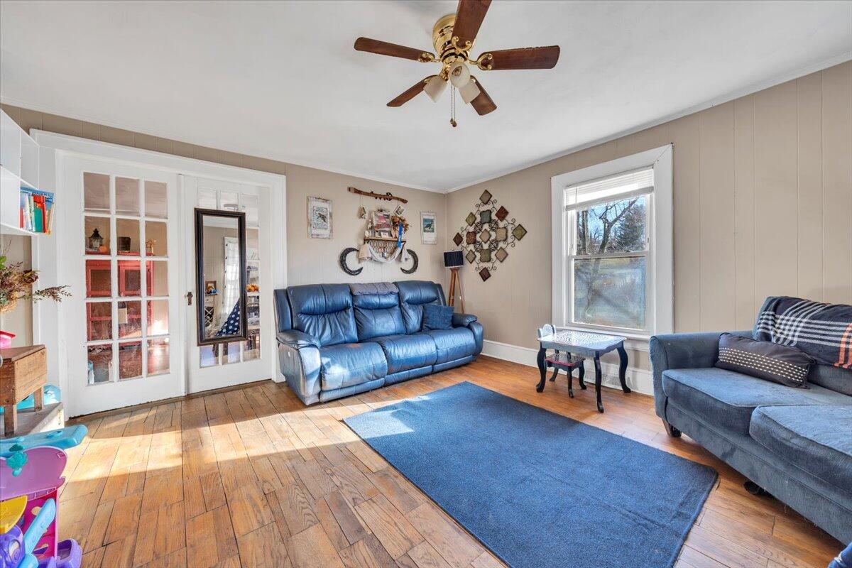 1319 Liberty Road Northeast Roanoke, VA 24012 - Photo 5 of 36 a living room with furniture and a dining table